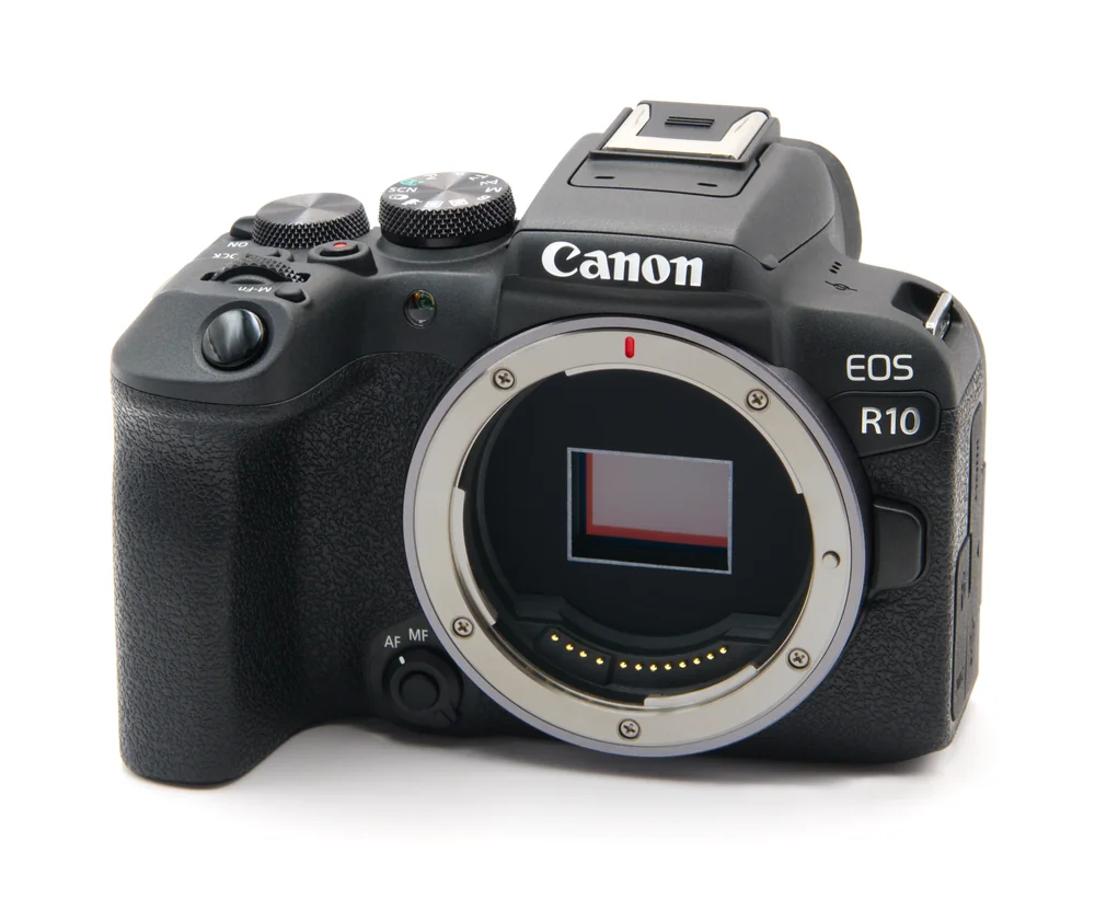 Canon EOS R10 body with exposed lens mount and no lens attached.